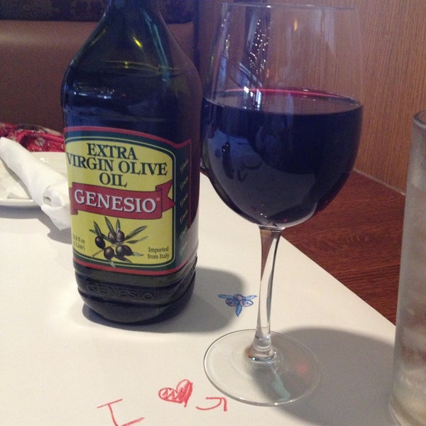 Photo taken at Romano&#39;s Macaroni Grill by Robin on 4/13/2013