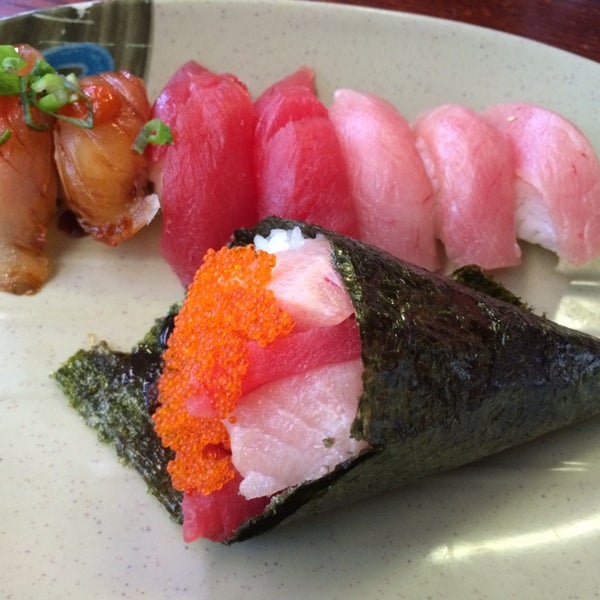 Photo taken at Sushi Pier I by Dan W. on 4/2/2014