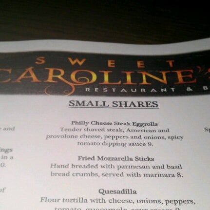 Photo taken at Sweet Caroline&#39;s Restaurant &amp; Bar by Cassi J. on 11/27/2012