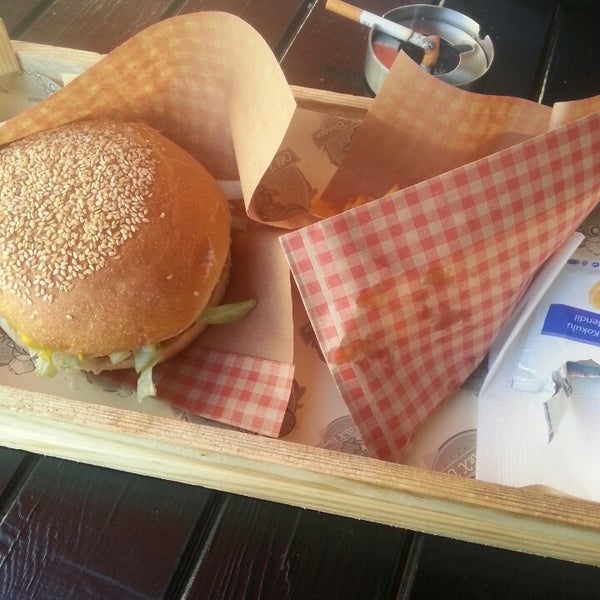Photo taken at Old T-Rex Burger by Yasemin A. on 7/7/2014
