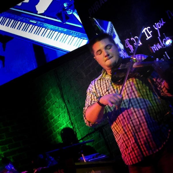 Photo taken at Bobby McKey&#39;s Dueling Piano Bar by Charles K. on 7/18/2015
