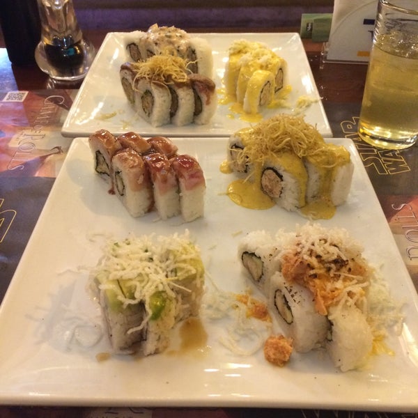 Photo taken at Wasabi Sushi &amp; Rolls by Junior on 11/14/2015
