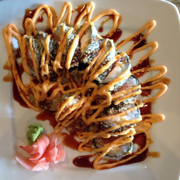 Photo taken at Tokyo Sushi Restaurant by Dia on 1/10/2014