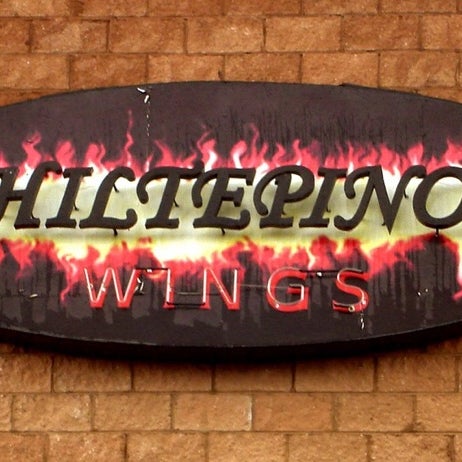 Foto tirada no(a) Chiltepino&#39;s Wings por Javier M. em 4/1/2014