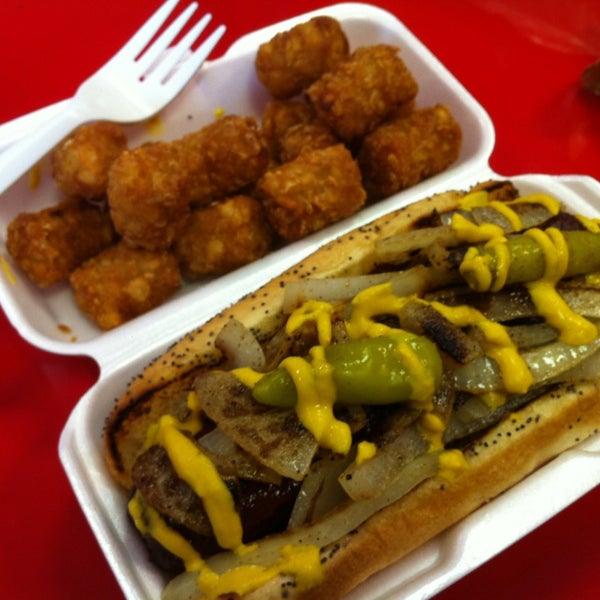 Photo taken at Greatest American Hot Dogs by David W. on 10/23/2013