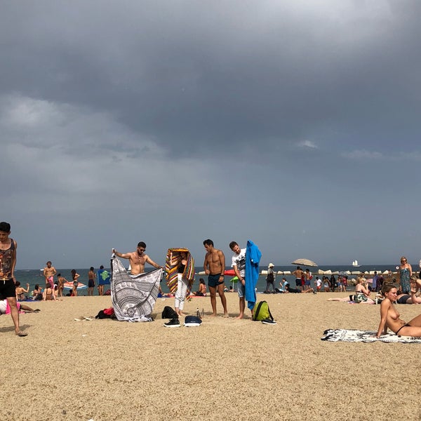 Photo taken at Sant Miquel Beach by Burcu S. on 7/13/2018