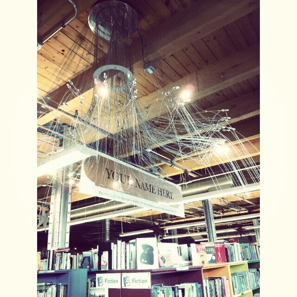 Photo taken at Open Books by Jenny O. on 8/12/2013