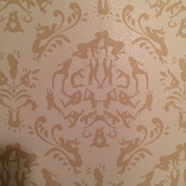 Bathroom wall paper is awesome.