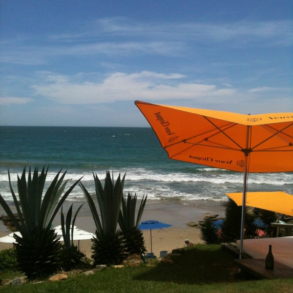 Photo taken at Rocka Beach Lounge &amp; Restaurante by Camila on 2/11/2013