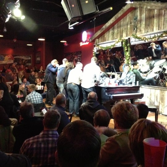 Photo taken at Shout House Dueling Pianos by Laura V. on 12/8/2012