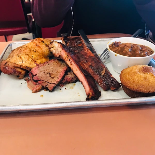 Photo taken at Smoking Pig BBQ Company by Eric R. on 4/22/2019