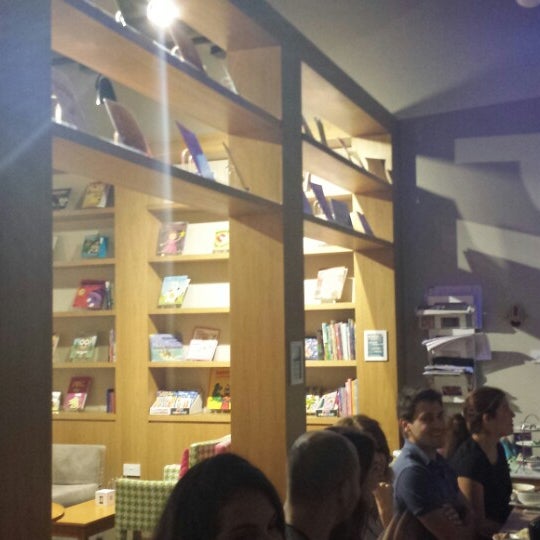 Photo taken at BookMunch Cafe by Ghida on 3/10/2014
