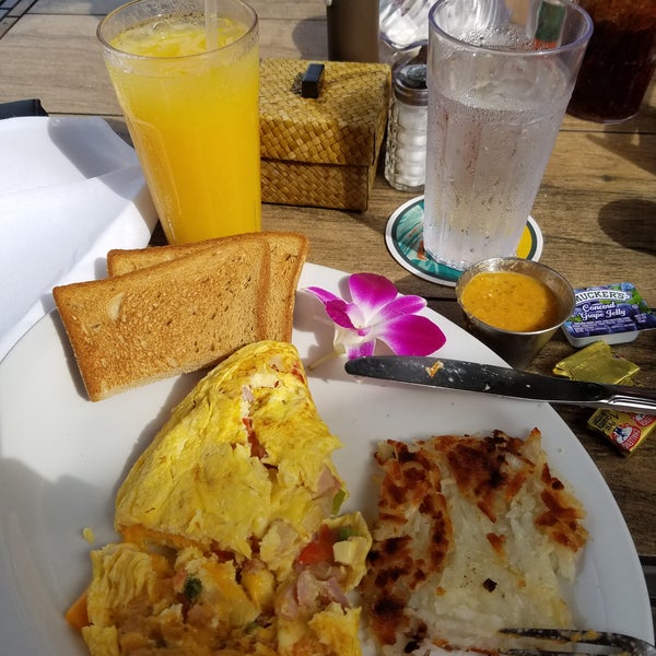 Traditional American food. Denver omelette was very good. Have a yellow/orange homemade salsa that is a must. Get a seat outside for the view. Direct beach access. No pricier than everything else.