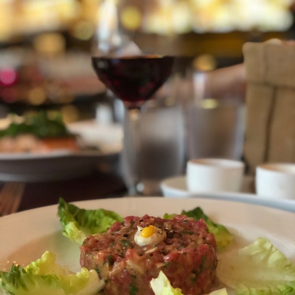 Steak tartare made to taste at the table. Fries. Glass of wine. What else do you need?