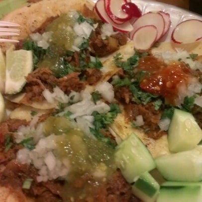Photo taken at Tacos El Chilango by Gladys N. on 12/18/2012