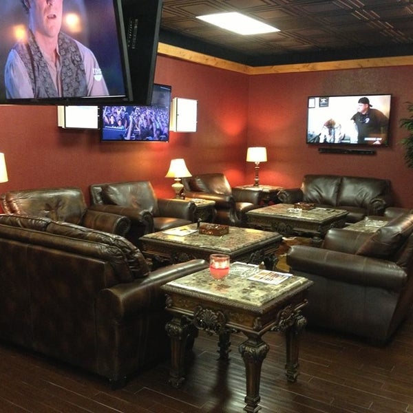 Photo taken at The Man Cave - Cigar &amp; Tobacco Lounge by Becky S. on 6/25/2013