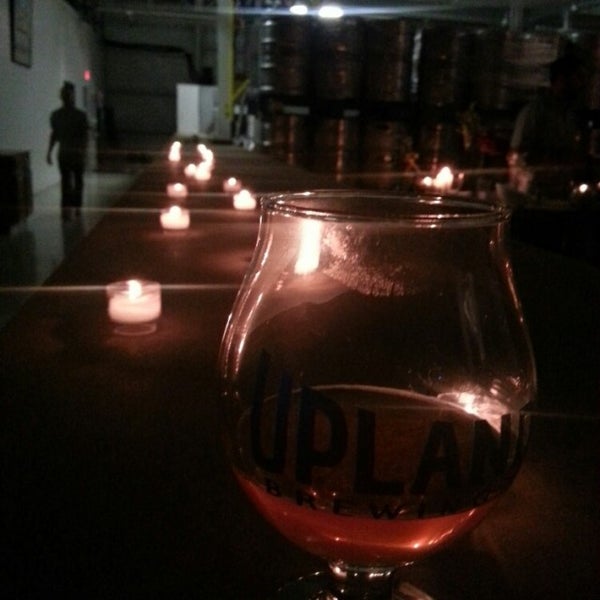 Photo taken at Upland Brewing Company Brewery &amp; Tasting Room by Melissa I. on 10/24/2015