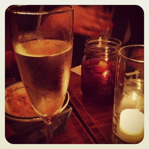 Photo taken at Tre Restaurant &amp; Wine Bar by Genna on 5/19/2013
