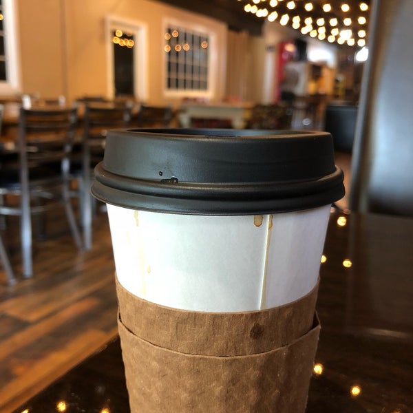 Photo taken at Tin Cup Coffee by Angela D. on 4/21/2018