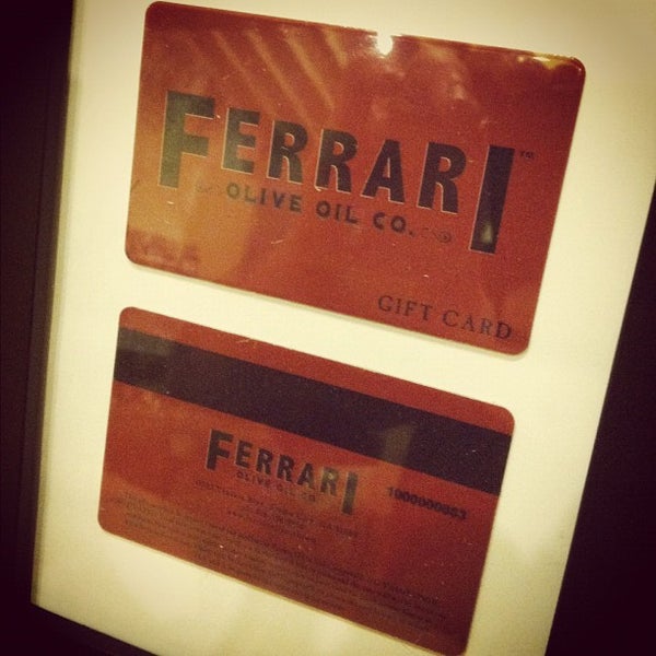 Photo taken at Olimila Gourmet Emporium by Ferrari O. on 12/14/2012