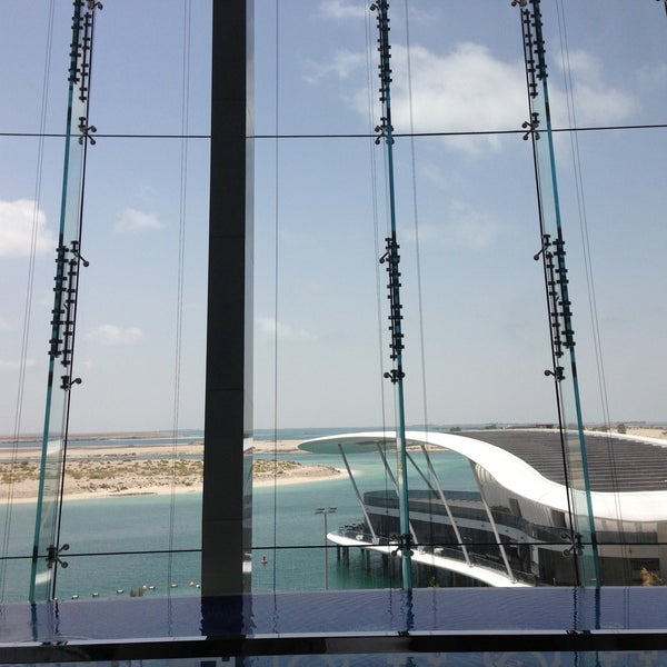 Photo taken at Conrad Abu Dhabi Etihad Towers by Natalia on 5/5/2013