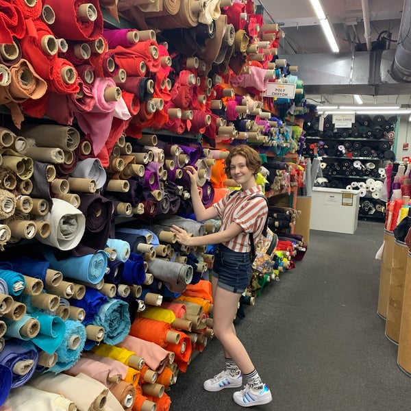 Photo taken at Mood Designer Fabrics by Mary Ann on 6/27/2019