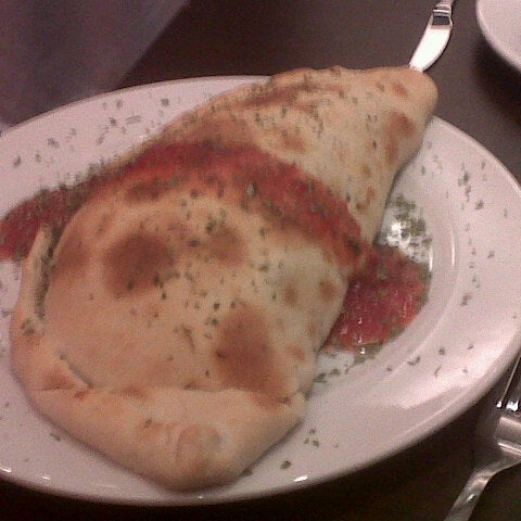 Photo taken at Capricciosa Pizza &amp; Pasta by Juan Martin G. on 10/14/2012