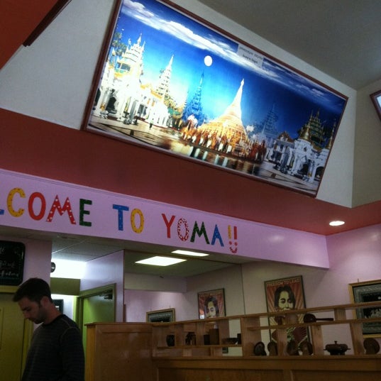 Photo taken at YoMa Burmese Restaurant by laura f. on 10/4/2012