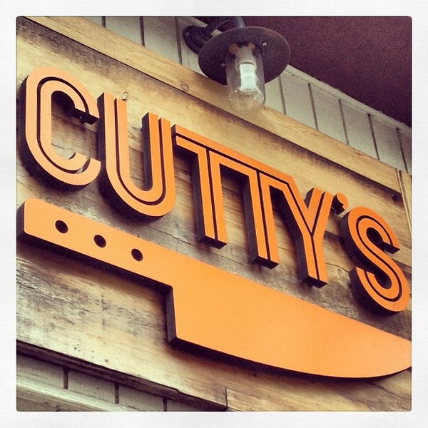 Photo taken at Cutty&#39;s by laura f. on 5/15/2013