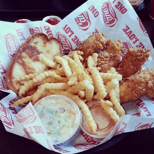 Photo taken at Raising Cane&#39;s Chicken Fingers by Kevin N. on 12/6/2013