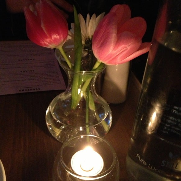 Photo taken at Petite Chou Bistro and Champagne Bar by Rebecca L. on 2/16/2013