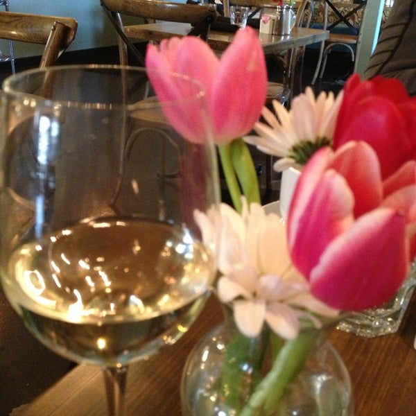 Photo taken at Petite Chou Bistro and Champagne Bar by Rebecca L. on 2/14/2013