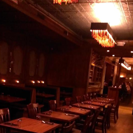 The menu has a lot of shareable small plates and snacks, as well as entrees like crispy braised pork cheeks and roasted elk with spaetzle. The space was a speakeasy in a previous life.