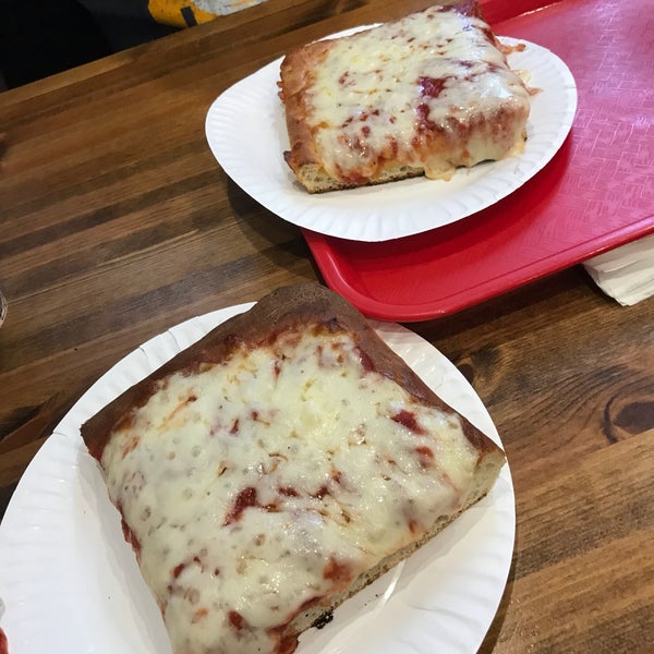 Photo taken at Famous Famiglia Pizza by Michelle on 10/9/2017