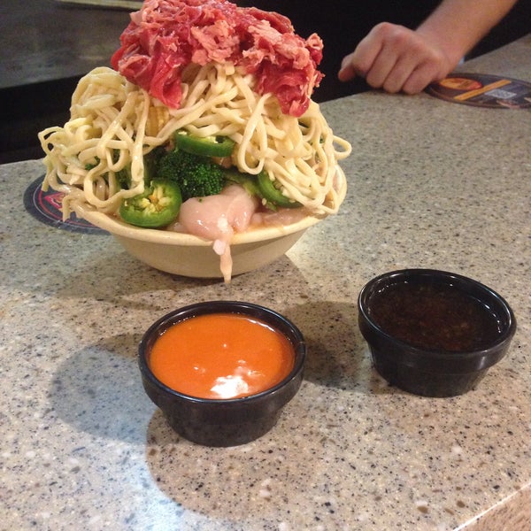 Photo taken at bd&#39;s Mongolian Grill by Stephanie P. on 7/8/2015