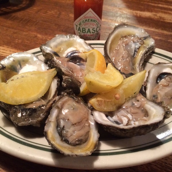 Wood grilled oysters.