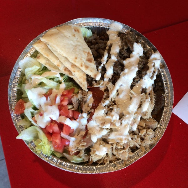 Photo taken at The Halal Guys by Vic Z. on 7/21/2016