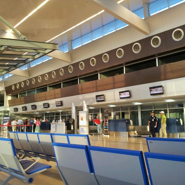 Photo taken at Aeropuerto Internacional Enrique Malek (DAV) by Sergio M. on 3/19/2013