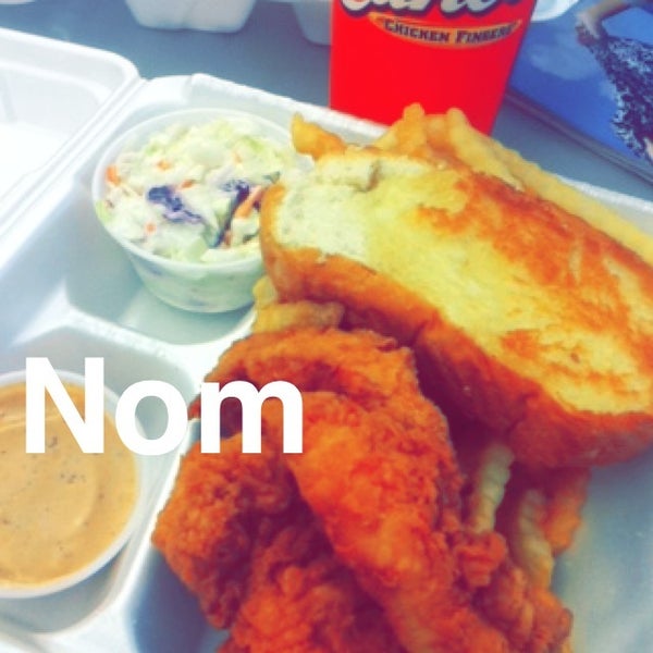 Photo taken at Raising Cane&#39;s Chicken Fingers by Yahdiel O. on 5/22/2014