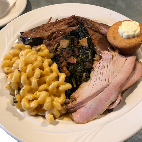 Photo taken at Blue Tractor BBQ &amp; Brewery by Jeremiah C. on 1/11/2019