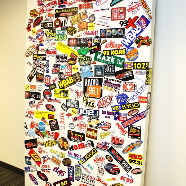 Don't see your station's sticker on our radio station wall? Send it our way! We'd love to add you to the wall of fame.