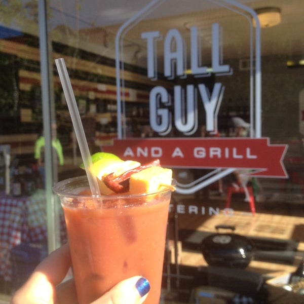 Photo taken at Tall Guy and a Grill by Caitlin M. on 6/29/2014