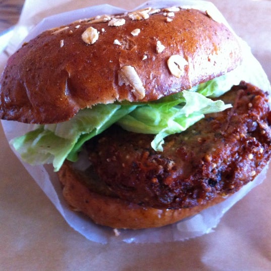 Photo taken at BurgerFi by Mandi C. on 9/29/2012