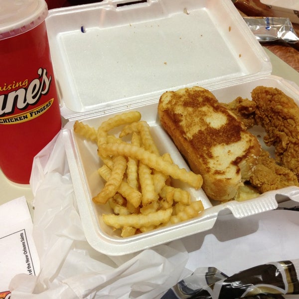 Photo taken at Raising Cane&#39;s Chicken Fingers by Christine N. on 12/18/2012
