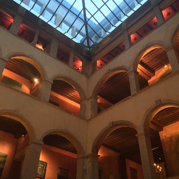 Photo taken at Hôtel Cour des Loges by Serdar on 5/12/2016
