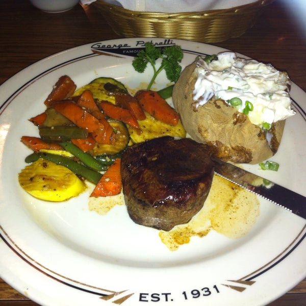 Photo taken at George Petrelli Steak House by Stella B. on 3/21/2014