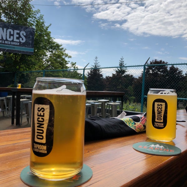 Photo taken at Ounces Taproom &amp; Beer Garden by Dani on 5/20/2018