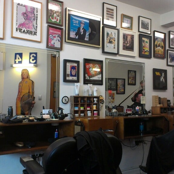 Photo taken at Maloney&#39;s Barber Shop by Christian F. on 3/7/2013