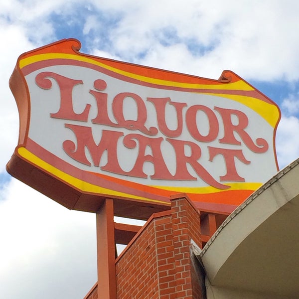The building that Liquor Mart is located in was constructed in 1962. Amazing vintage sign.