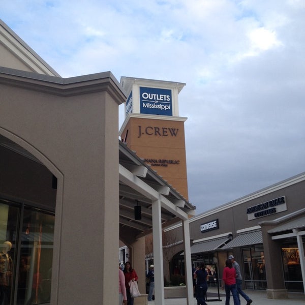 Photo taken at Outlets Of Mississippi by Alison P. on 2/23/2014